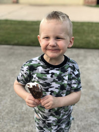 child with ice cream smiling